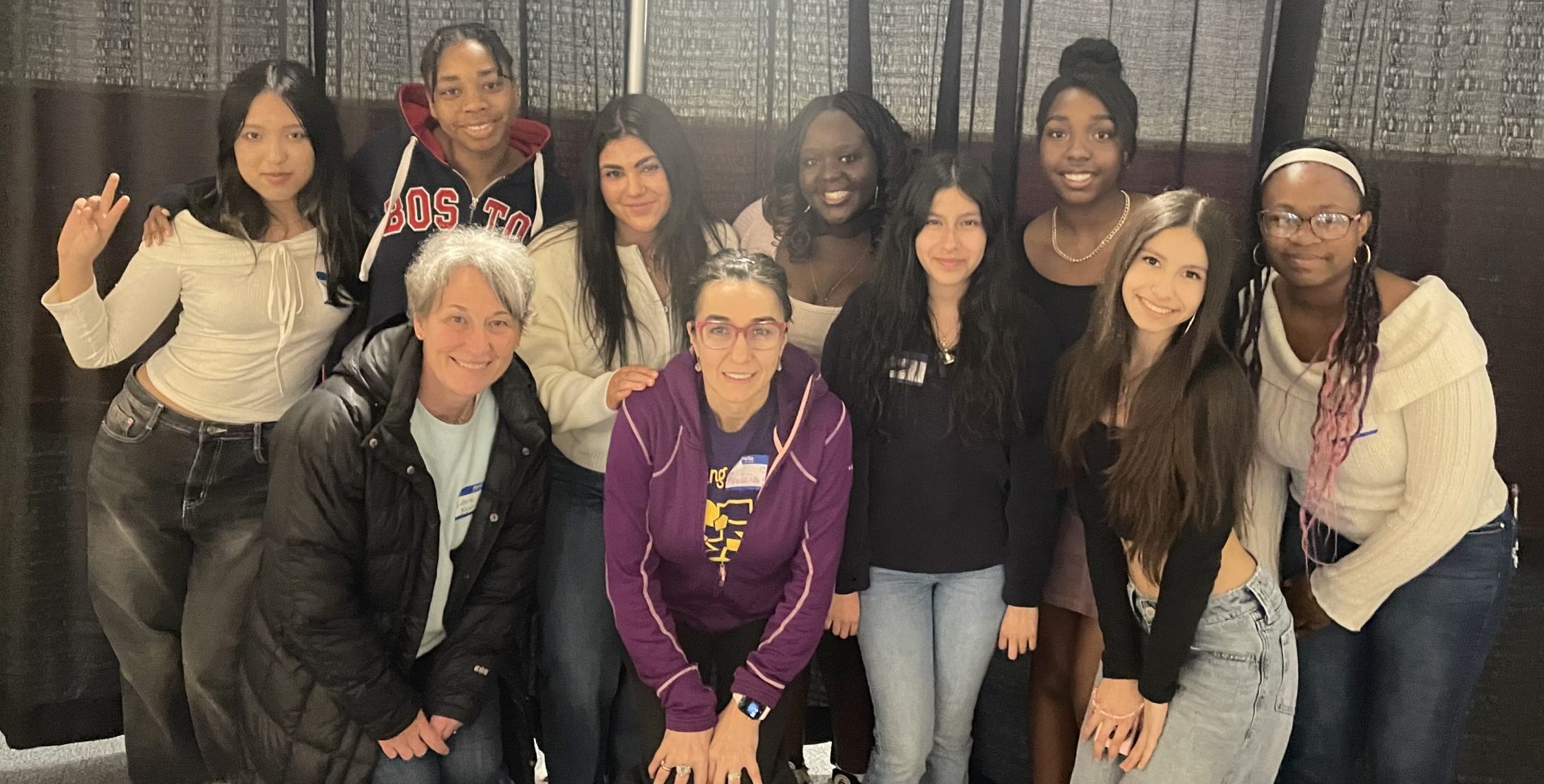 Students attend AISNE conference at Regis College